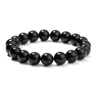 Black Onyx Bracelet featuring smooth 8MM black agate beads on an elastic cord for women.