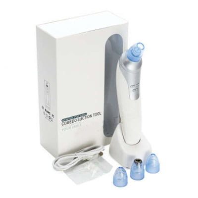 Electric Acne Machine in silver color with suction heads and packaging for blackhead removal.