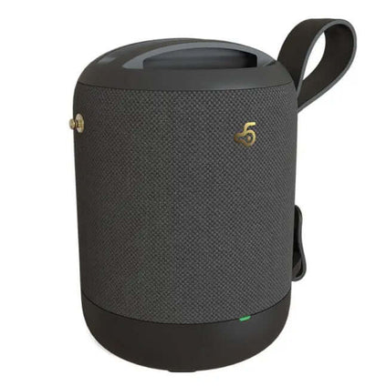 Wireless bluetooth speaker in a stylish design with a handle and sleek fabric finish.