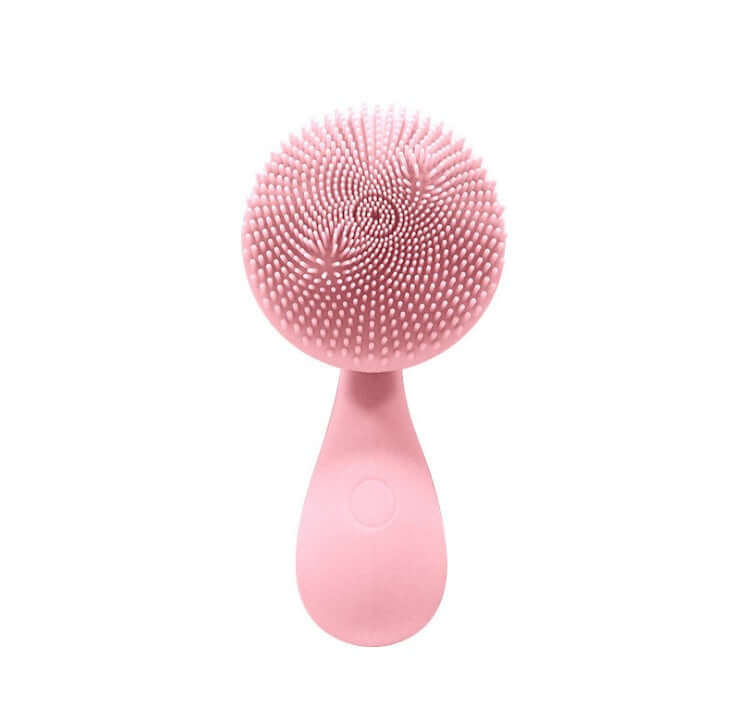 Electric face washer in rose pink color with silicone bristles for cleansing and massage.