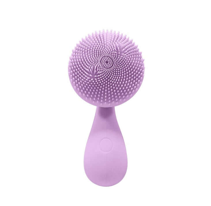 Electric face washer in purple silicone with textured bristles for cleansing and massage.