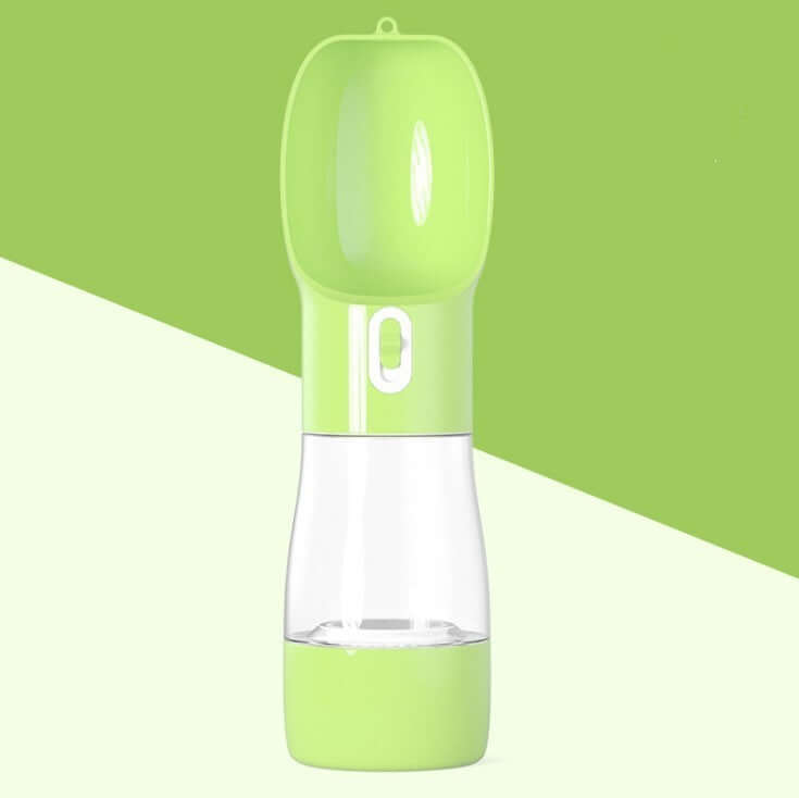Traveling Out Portable Dog Water Dispenser in green color, ideal for outdoor use with food and water storage.