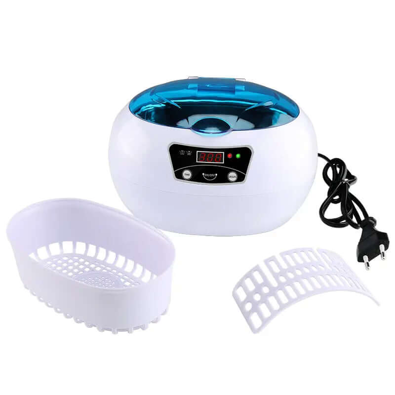 Ultrasonic cleaning machine for home with digital control, cleaning basket, and accessories.