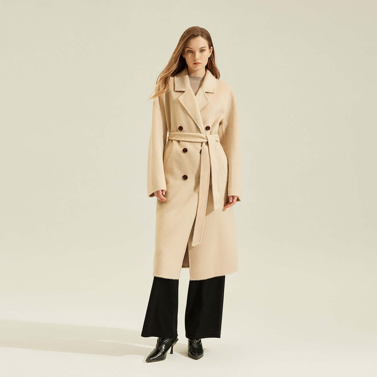 Women's Camel Coat Reversible Woolen Jacket worn by a model against a neutral background, showcasing its stylish design.