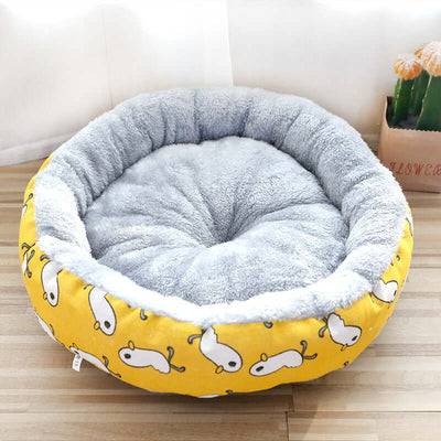 Dog And Cat Litter Padded With Round Cotton in yellow with cartoon pattern and soft gray interior.
