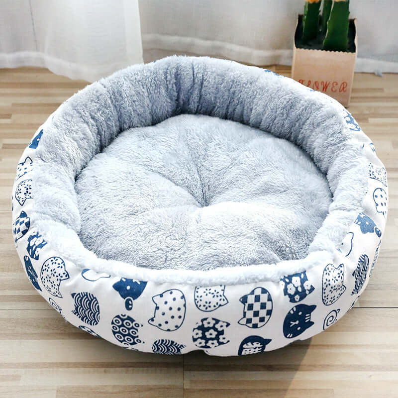 Dog And Cat Litter Padded With Round Cotton plush pet bed in gray with cartoon patterns, perfect for small to large pets.