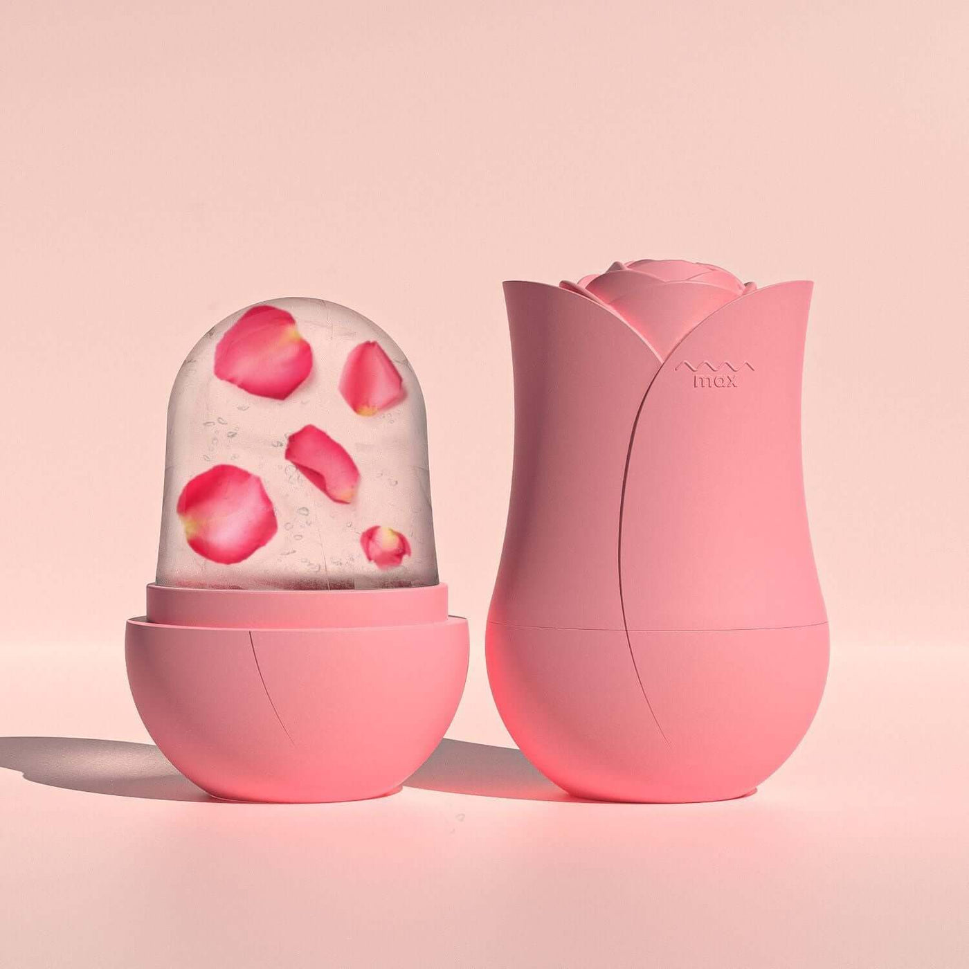 Cooling Roller Apply Face Plastic Ice Cube Tray in pink with rose petals, featuring a stylish container design.