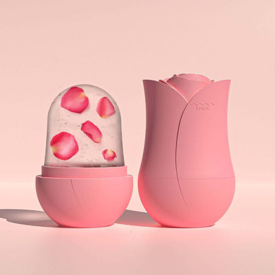 Cooling Roller Apply Face Plastic Ice Cube Tray in pink with rose petals, featuring a stylish container design.