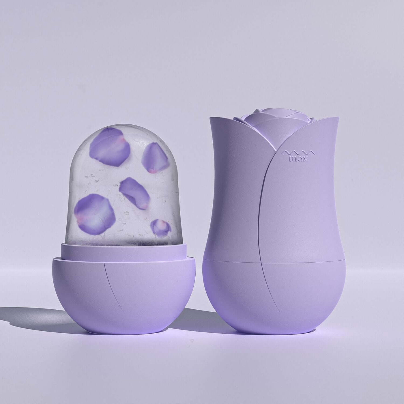 Cooling Roller Apply Face Plastic Ice Cube Tray in lavender with rose design for skincare use.