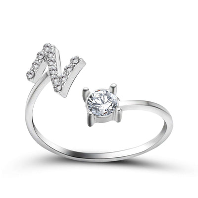 New Design Adjustable 26 Initial Letter Ring Fashion Jewelry For Women Simple Elegant Jewelry featuring a letter and diamond accents.