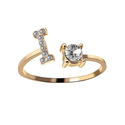 New Design Adjustable 26 Initial Letter Ring Fashion Jewelry For Women Simple Elegant Jewelry with a diamond accent.