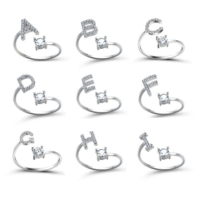 New Design Adjustable 26 Initial Letter Ring Fashion Jewelry For Women Simple Elegant Jewelry displayed in multiple letters.